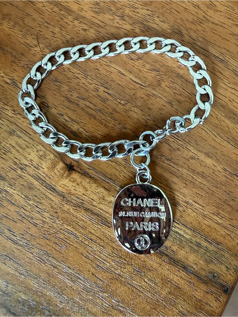 ChaneI Silver-Tone Chain Bracelet with Oval Charm